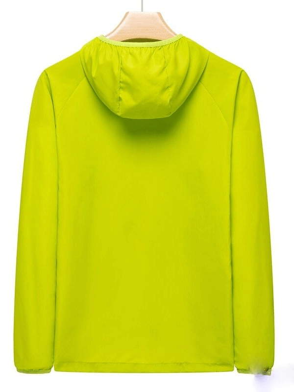 Back view of yellow waterproof reflective sun-protective women's hiking jacket with hood for camping.